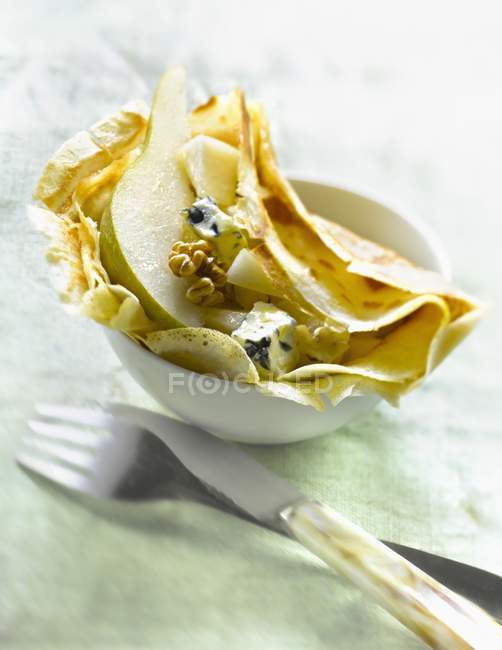 Pancake with pear and walnuts — Stock Photo