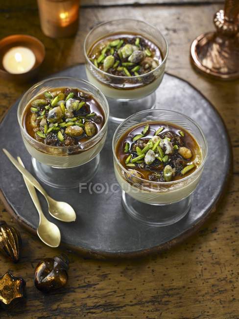 Dates and pistachios dessert — Stock Photo