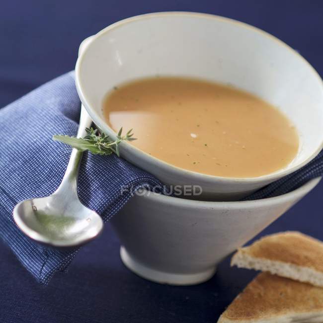 Fish soup in white plates — Stock Photo