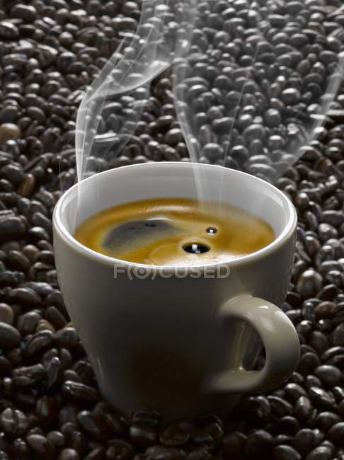 Cup of hot black coffee — Stock Photo