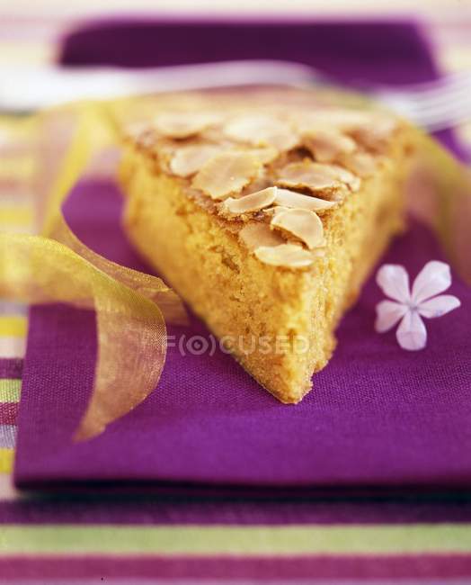 Piece of almond cake — Stock Photo