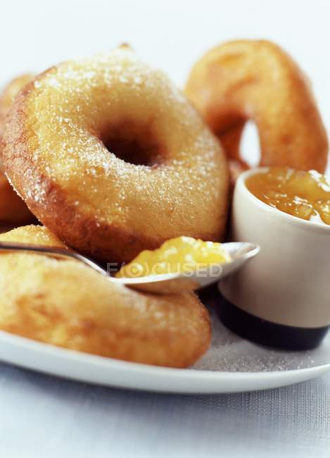 Apple donuts with sugar powder — Stock Photo