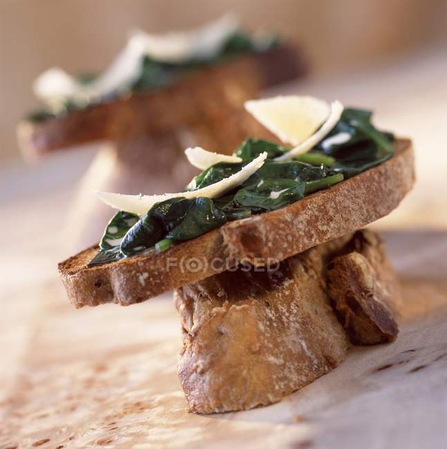 Spinach sprouts on toast — Stock Photo