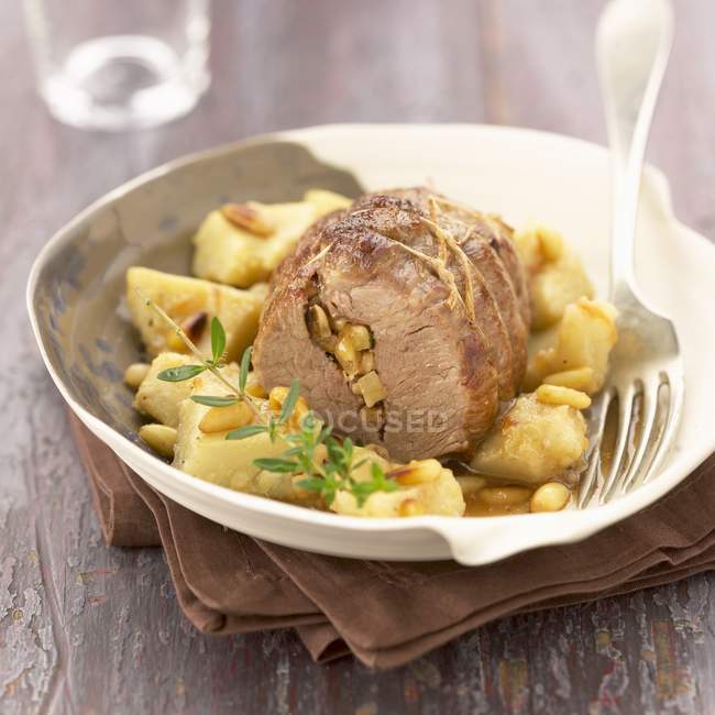 Lamb roast with artichoke hearts — Stock Photo
