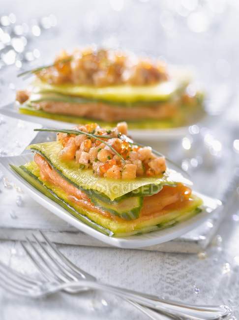 Salmon, pineapple and cucumber mille-feuille — Stock Photo