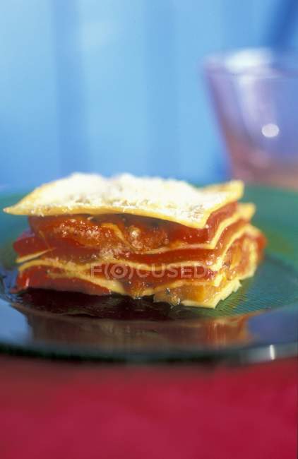 Pepper and tomato lasagne piece — Stock Photo