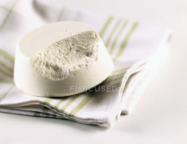 Ricotta cheese on towel — Stock Photo