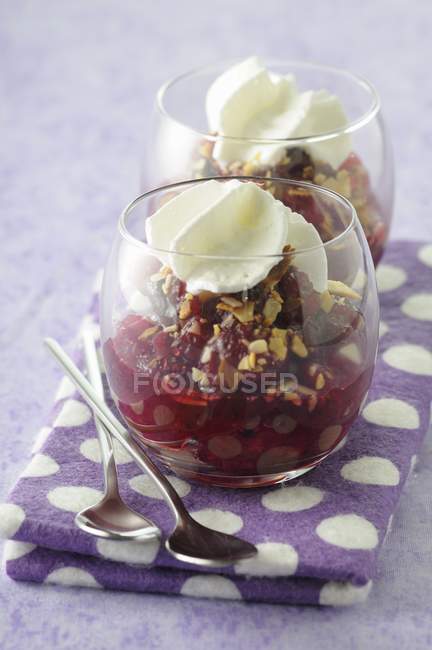 Stewed cranberries with crushed nuts — Stock Photo