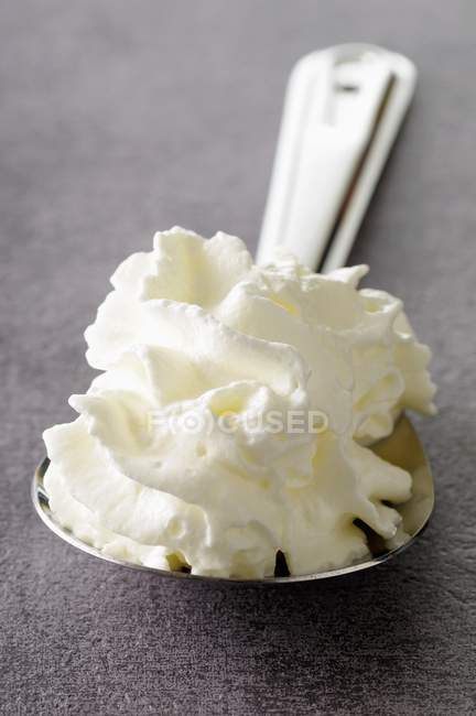 Spoonful of whipped cream — Stock Photo