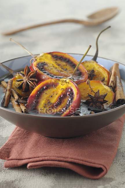 Tamarillos poached in wine — Stock Photo