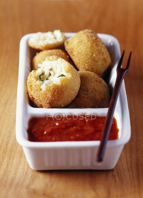Rice croquettes and sauce — Stock Photo