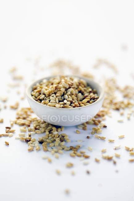 Sesame seeds in bowl — Stock Photo