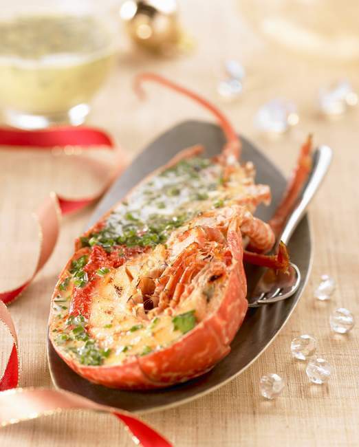 Closeup view of grilled lobster half with herbs — Stock Photo
