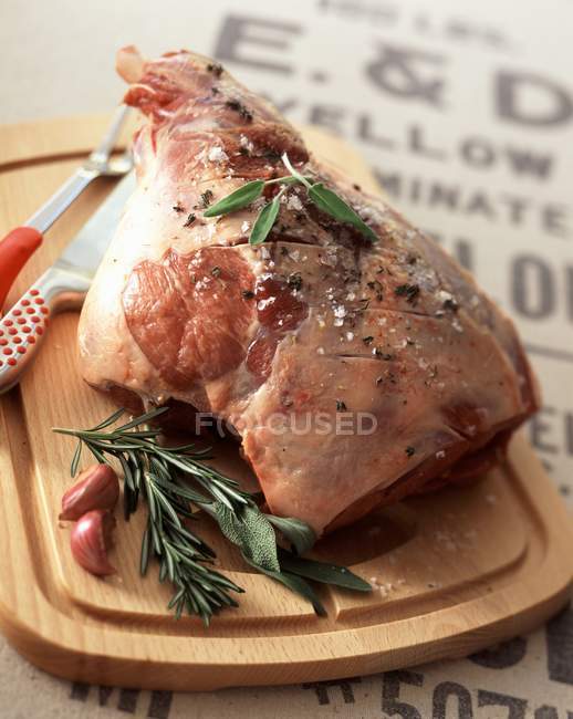 Raw marinated Leg of lamb — Stock Photo