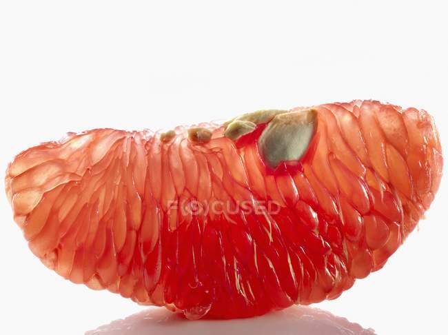 Рожевий грейпфрут сегмент — стокове фото