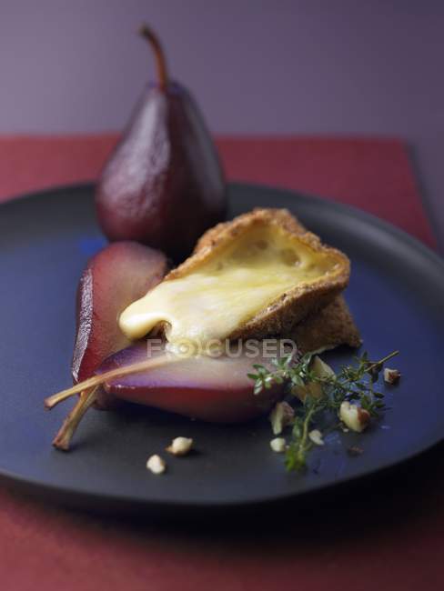 Livarot with hazelnuts and pears — Stock Photo