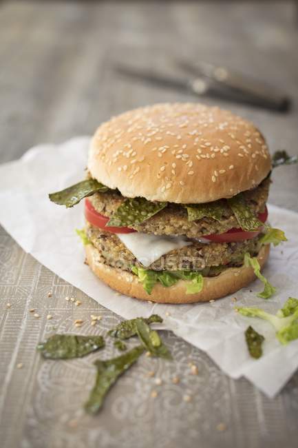 Quinoa burger with algae bacon — Stock Photo
