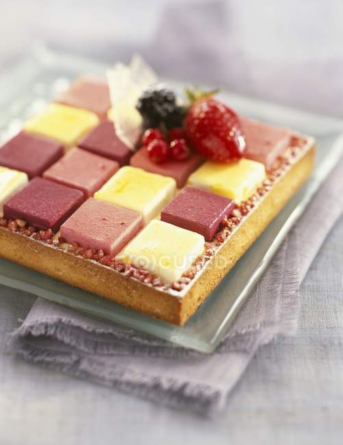 Sorbet cake on glass plate — Stock Photo