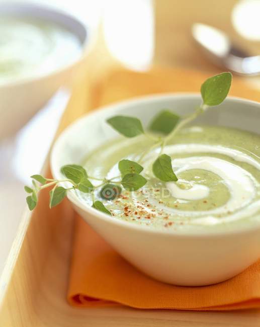 Creamed courgette and savory soup — Stock Photo