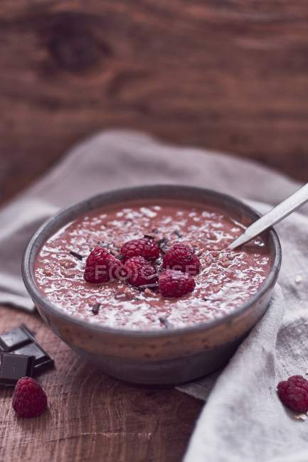 Chocolate porridge with raspberries — Stock Photo