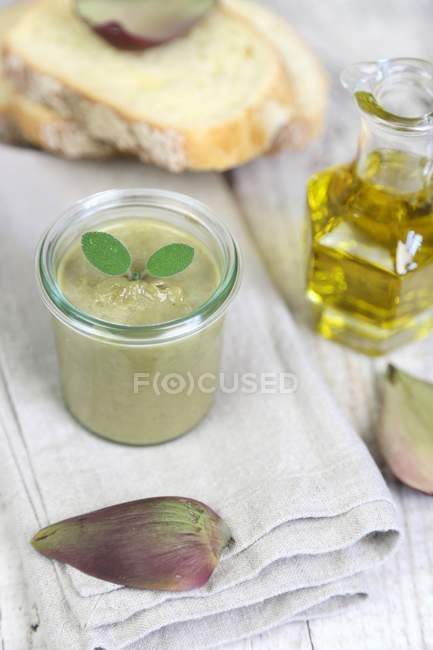 Artichoke cream in jar — Stock Photo