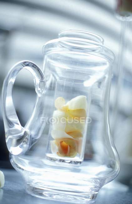 Glass teapot with fruit tea — Stock Photo