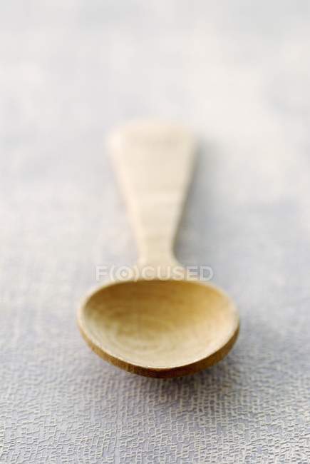 Closeup view of one wooden spoon — Stock Photo