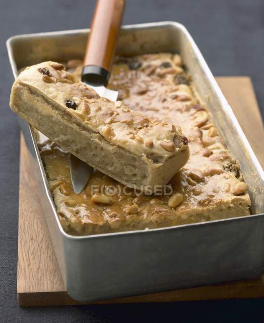 Chestnut cake in baking pan — Stock Photo