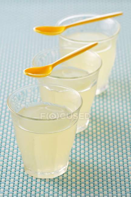 Glasses of lemon cordial — Stock Photo