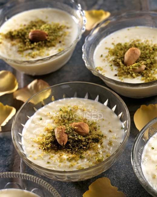 Rice pudding with pistachios — Stock Photo
