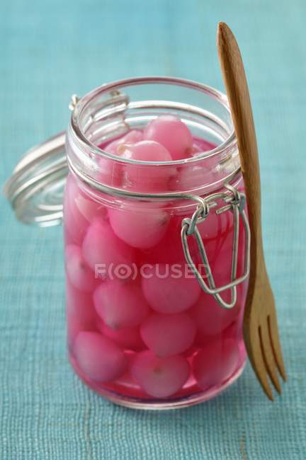 Jar of small onions — Stock Photo