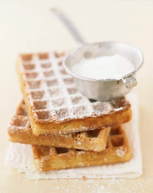 Waffles with icing sugar — Stock Photo