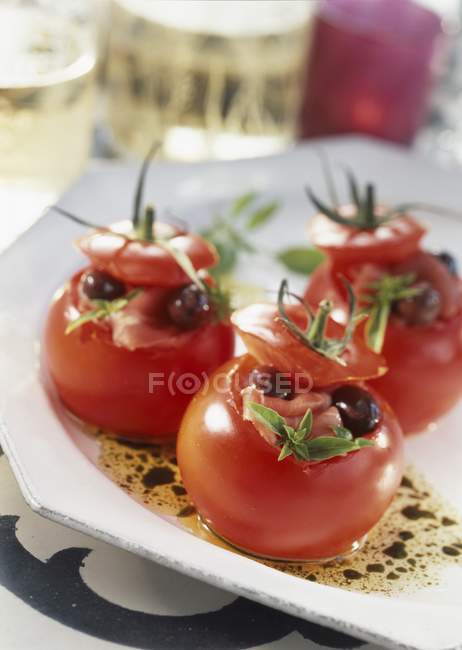 Tomatoes stuffed with ham — Stock Photo