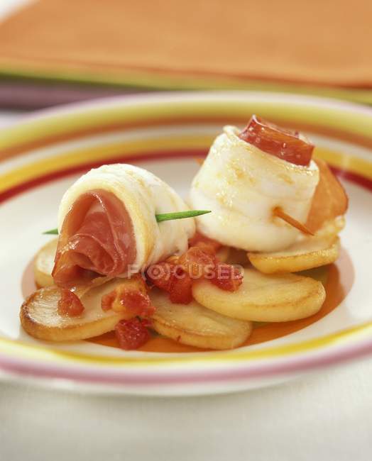 Bacon rolls with skewers — Stock Photo