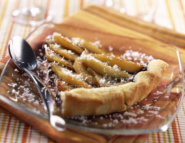 Slice of chocolate and pear tart — Stock Photo