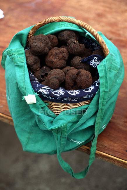 Fresh truffles in basket — Stock Photo