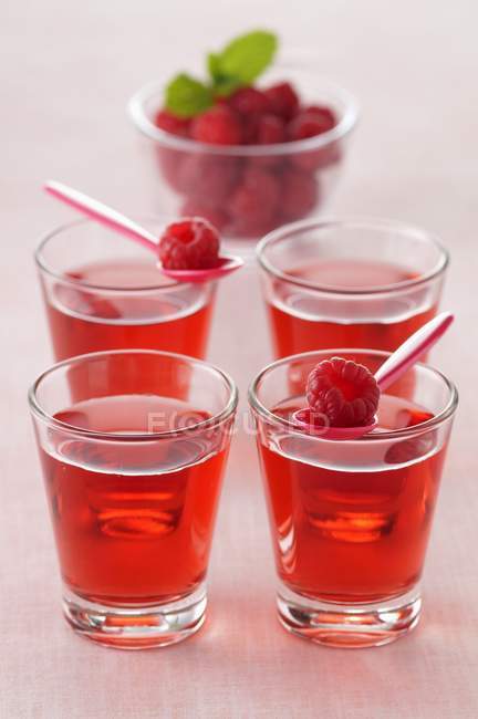 Glasses of raspberry cordial — Stock Photo