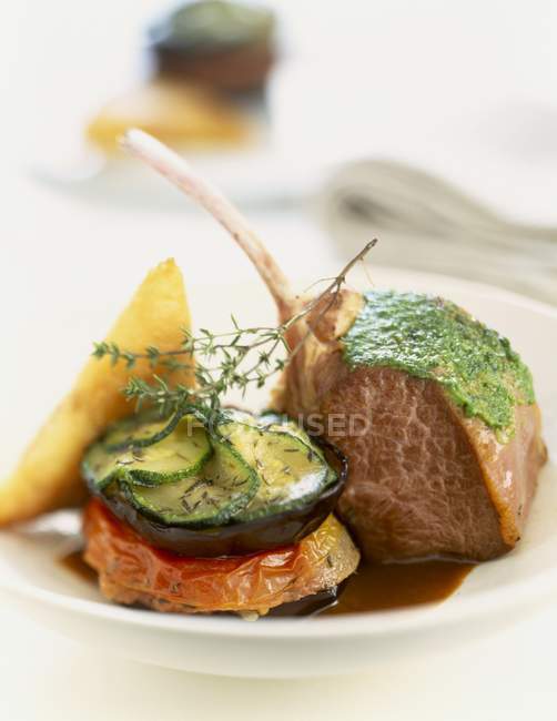 Lamb chop with herbs — Stock Photo