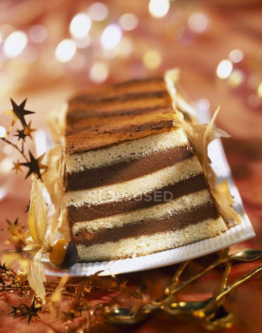 Chocolate praline and Cointreau log cake — Stock Photo