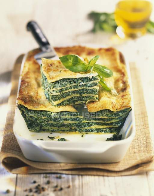 Portion of Lasagne florentine with spinach — Stock Photo