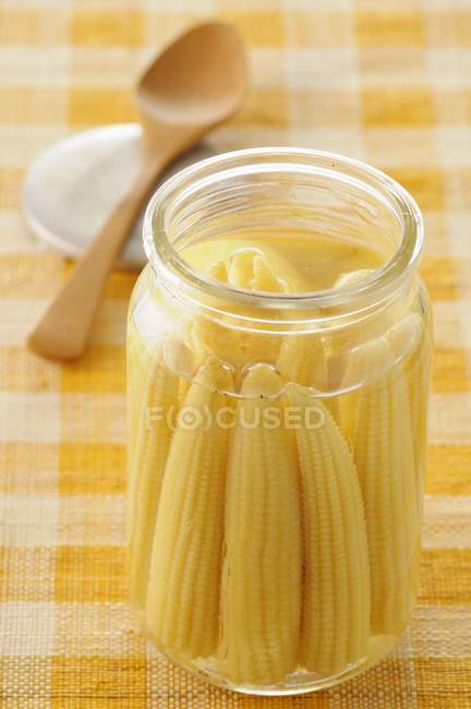 Glass  jar of mini corn — Stock Photo