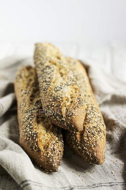 Heap of Baguettes with seeds — Stock Photo