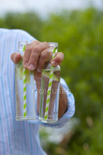 Virgin mojitos in glass bottles — Stock Photo