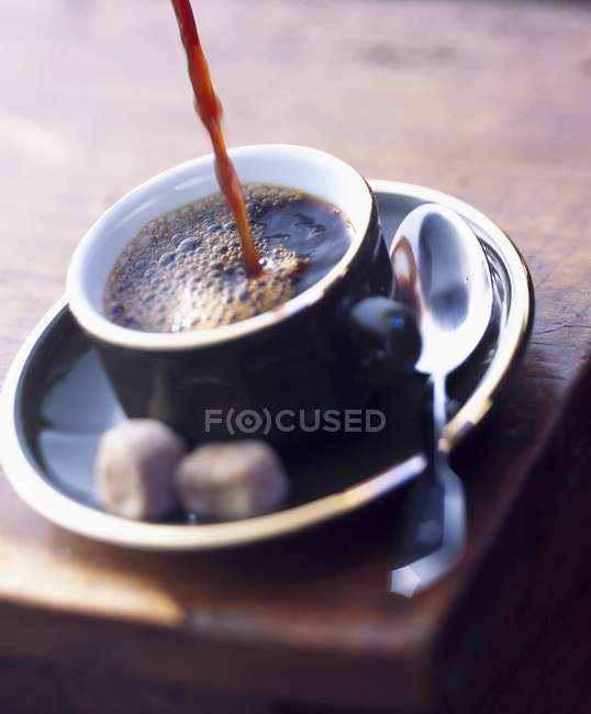 Pouring Coffee Into Cup Stock Photo Pouring Coffee Into Cup Stock Photo