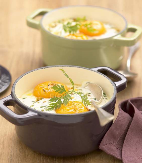 Coddled eggs in pan — Stock Photo