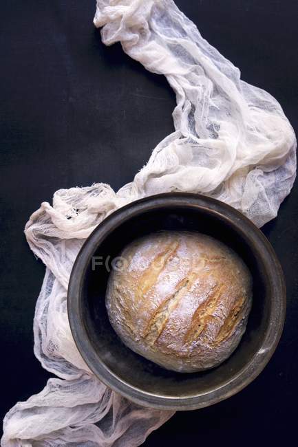Loaf of bread in tin — Stock Photo