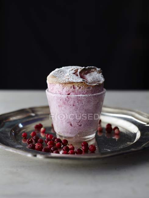 Lingonberry souffle on metal plate — Stock Photo