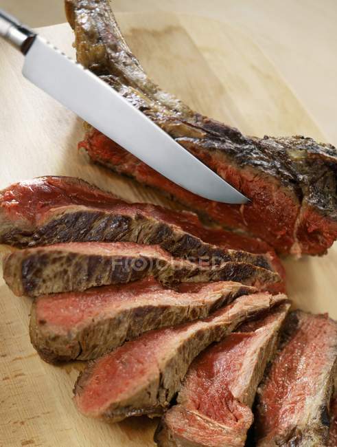 Roasted sliced Rib of beef — Stock Photo
