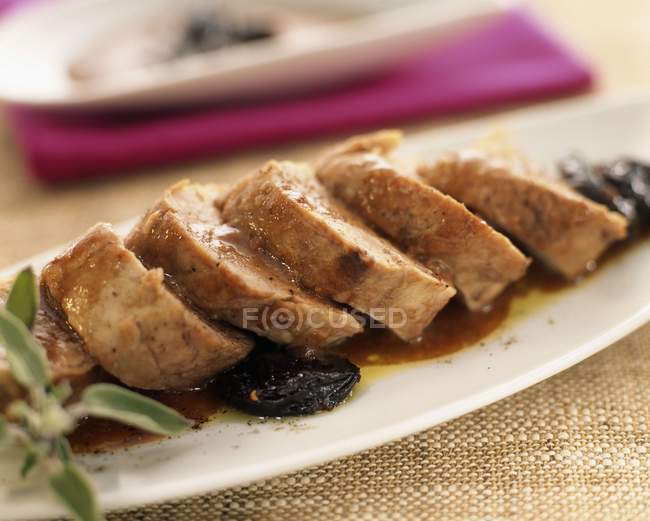 Sliced Pork fillet with plum — Stock Photo