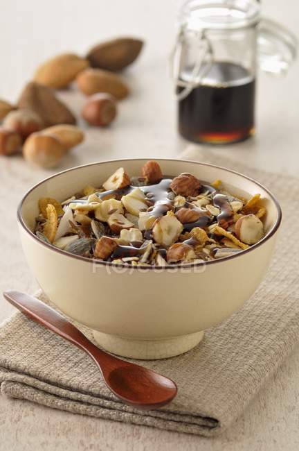 Muesli with dried fruits and maple syrup — Stock Photo